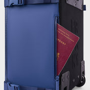 Passport in the hidden passport pocket of the FRENKY Underseat Trolley in Blue