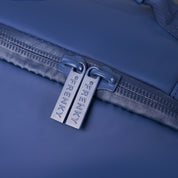Close-up of the FRENKY zipper pulls on the Underseat Trolley in Blue